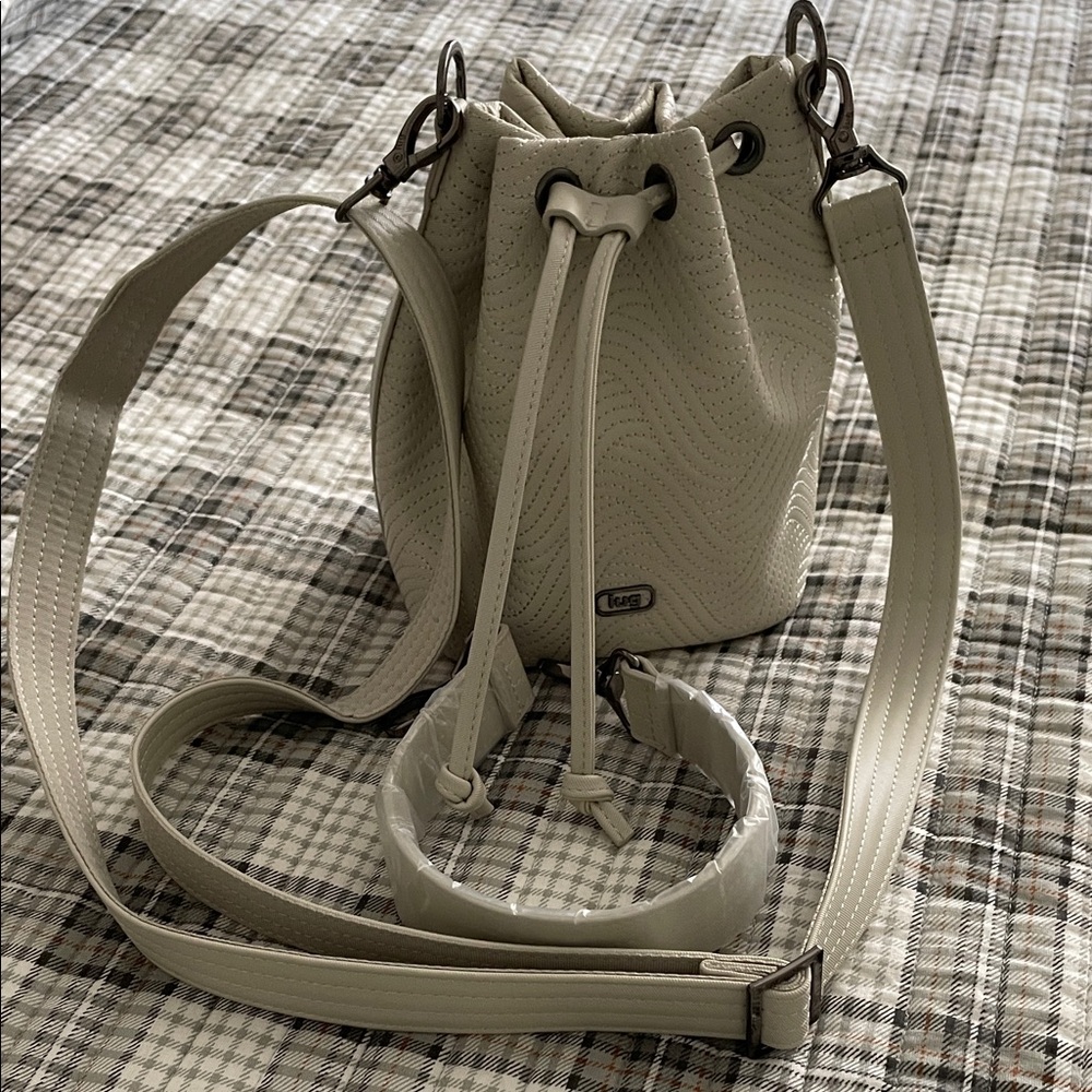 Lug WHIRLYBIRD Pebble Cream Crossbody Bucket Bag Satin Luxe Vegan Leather